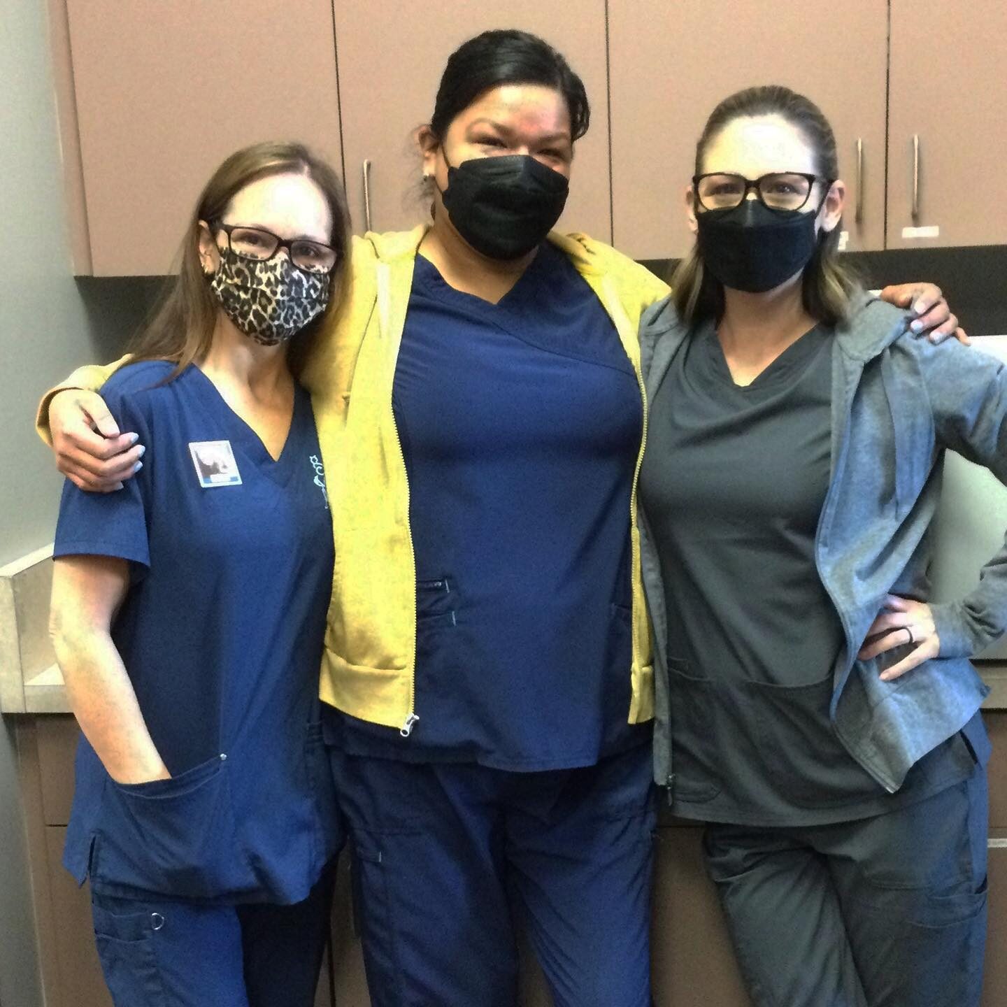 Three Staff Members With Masks